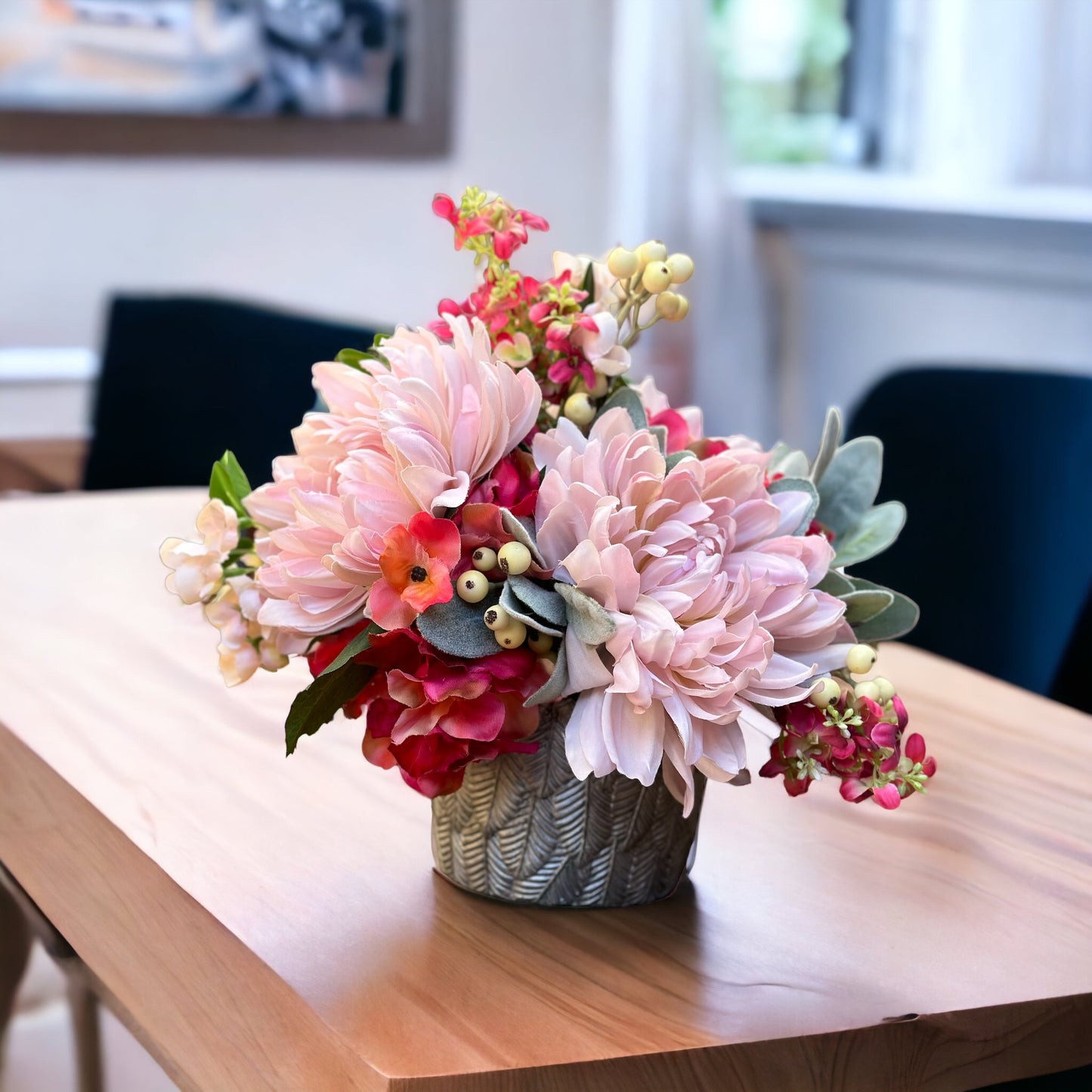 Blushing Blooms Elegance Floral arrangement